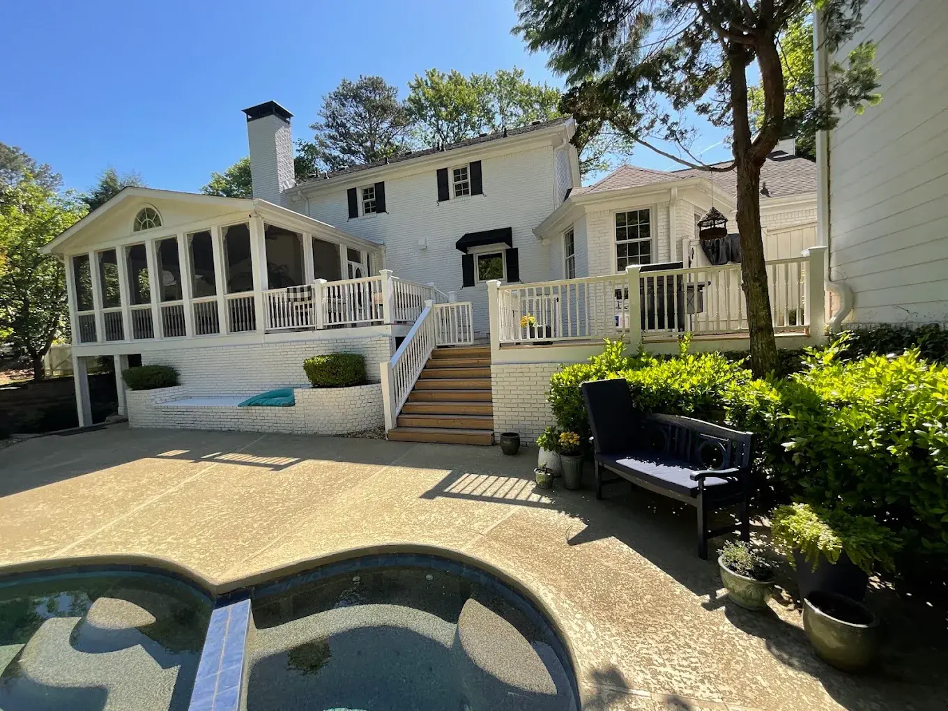 Professional painters completing a whole-house interior and exterior painting project in Atlanta, Georgia